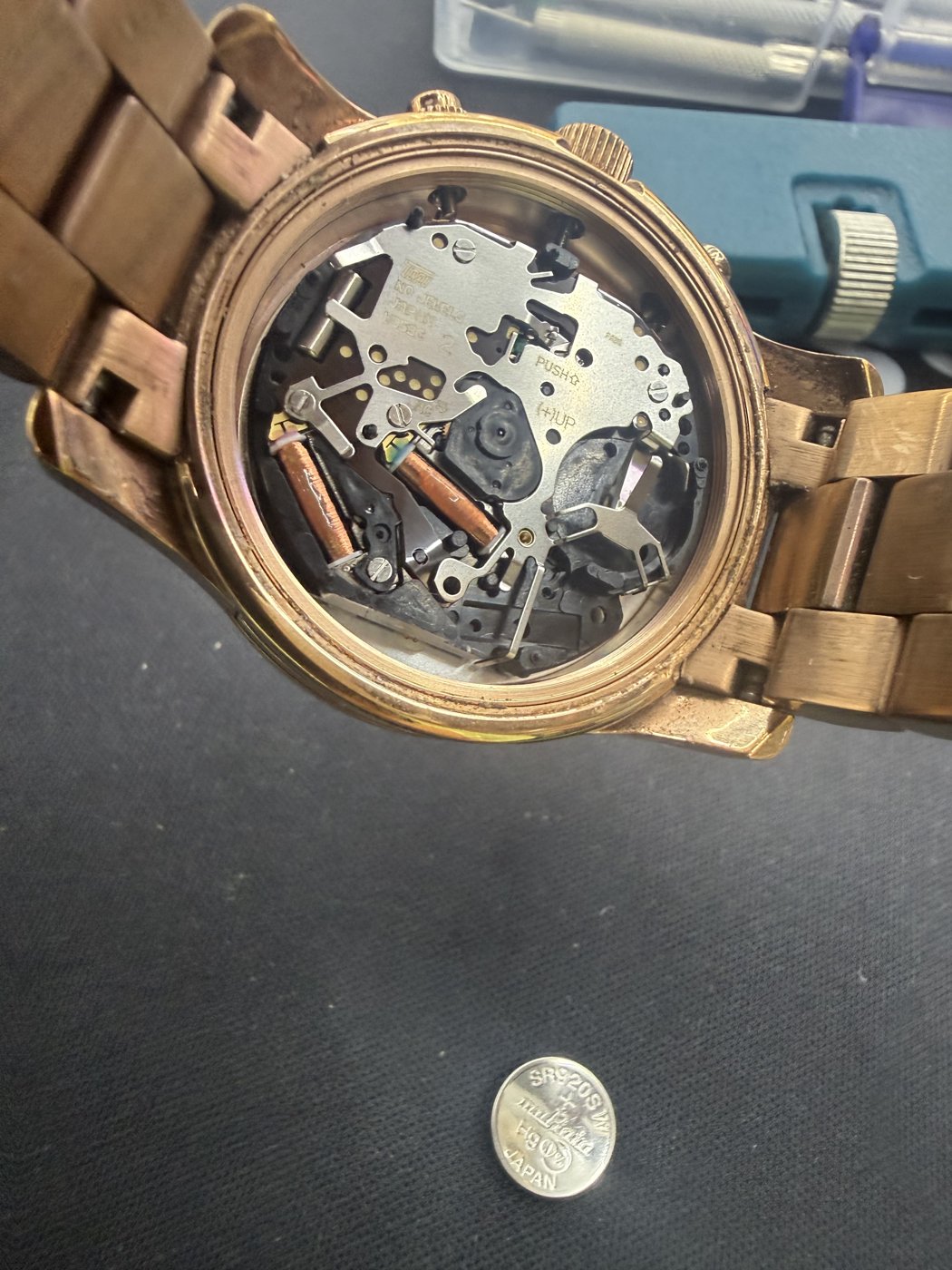 Open watch showing its internal mechanism