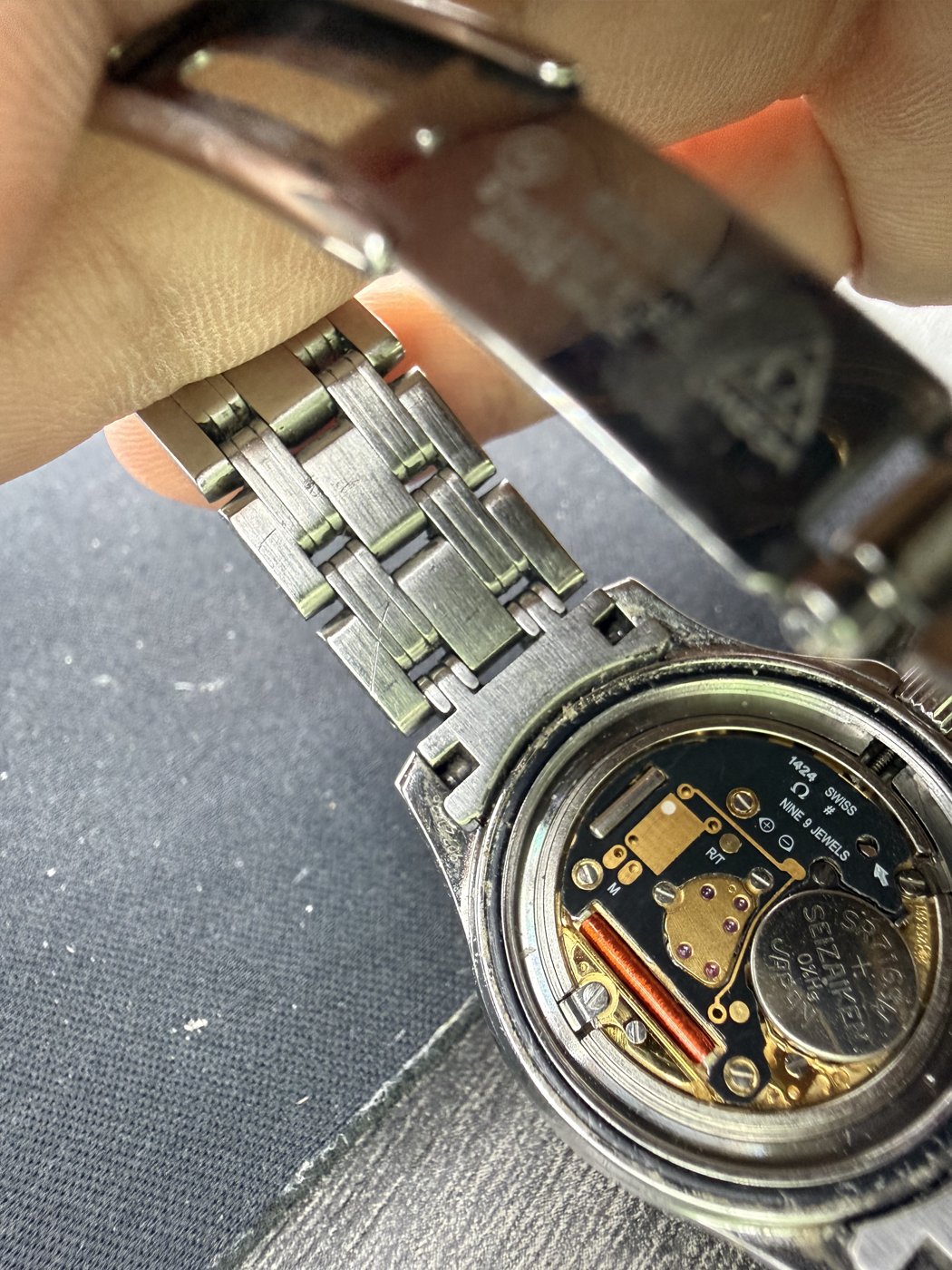 Open watch case and metal bracelet
